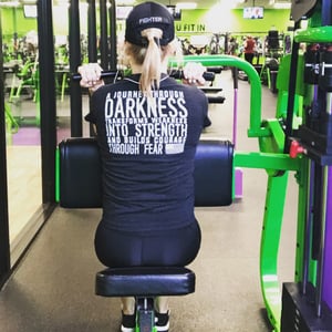 Ashley Williams exercising at gym