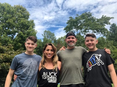 Renee Pickett with her husband and two sons