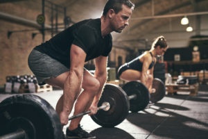 man deadlifting