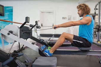 Man using row machine