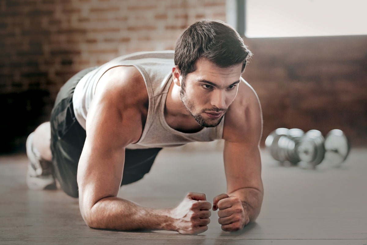 trainer doing a plank