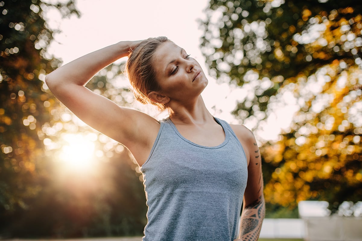 athlete stretching her neck