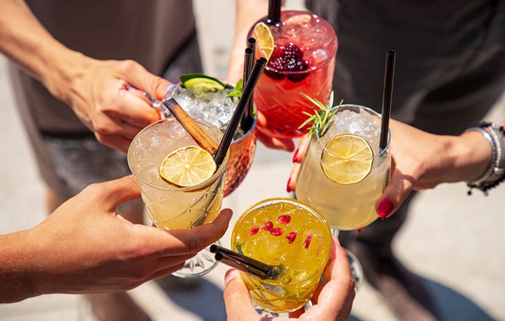 a group of people drinking alcohol