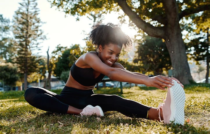 a beginner stretching outside