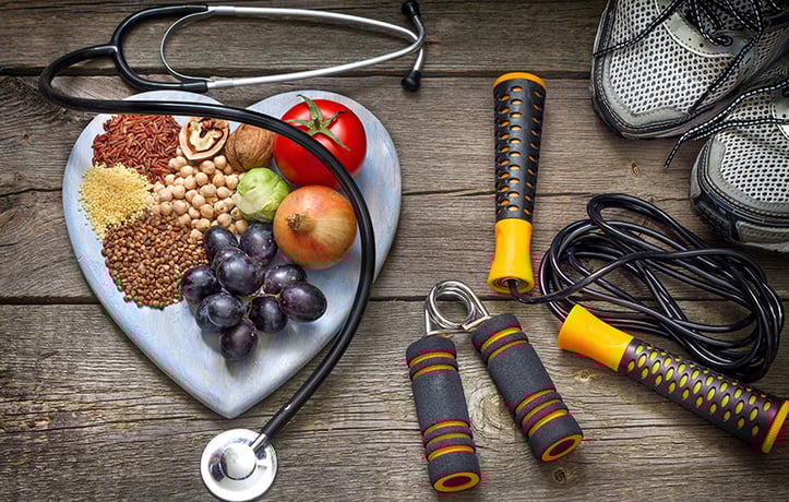 heart shaped plate full of healthy foods