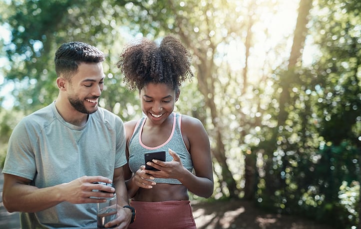 two fitness enthusiasts practicing emotional wellbeing