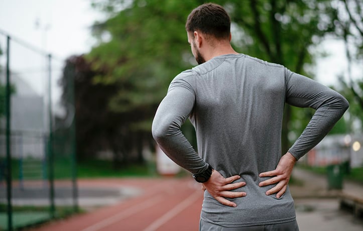 a man about to exercise to relieve his lower back pain