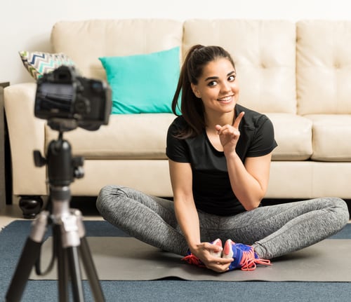 online personal trainer posing in front of camera
