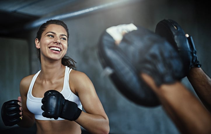 a woman boxing in the gym