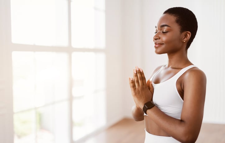 A woman meditating 