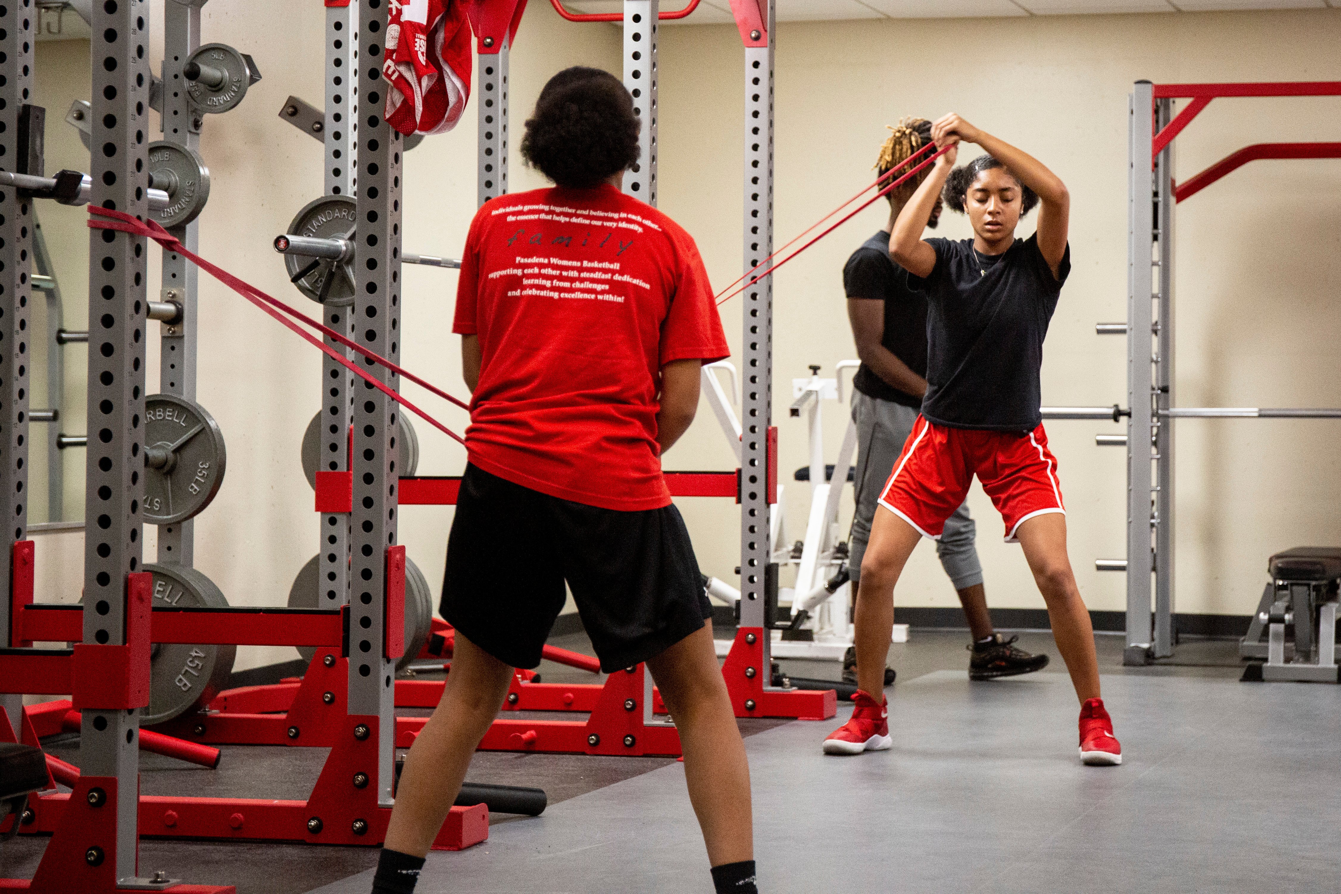 youth doing resistance training with cables