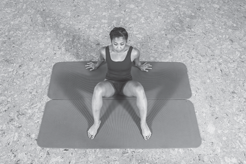 woman doing a hip spine shoulder stretch