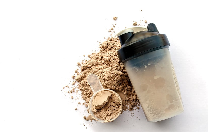 a bottle full of protein powder